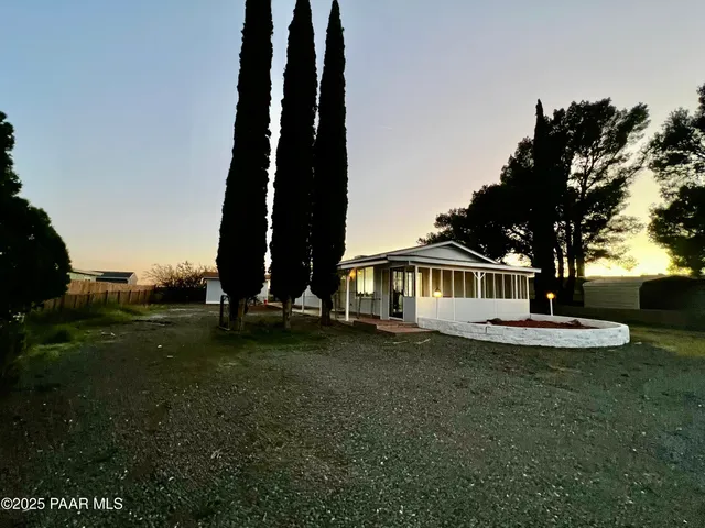 a house view with a garden space