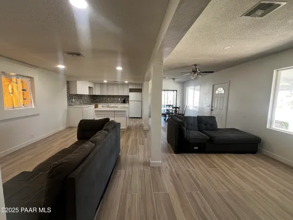 a view of a hallway with washer and dryer