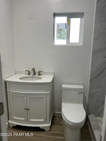 a view of a backyard of the house