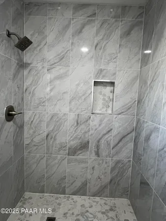 a view of house with outdoor space and garden