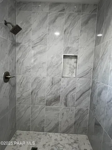 a view of house with outdoor space and garden