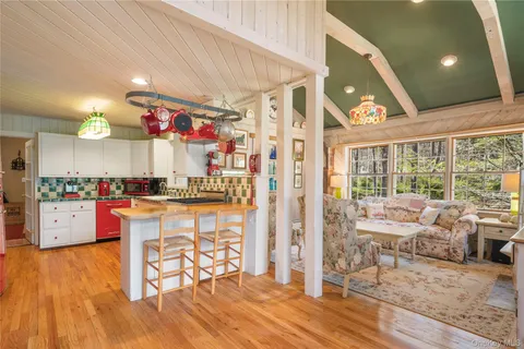 a kitchen with stainless steel appliances granite countertop a stove and cabinets