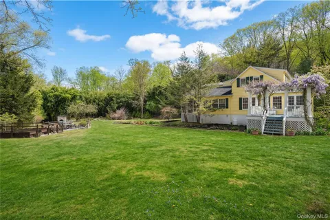 a view of a house with a big yard