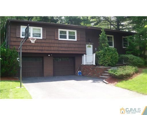 38 Wilk Road Edison, NJ 08837 - Photo 1 of 25 a house view with a outdoor space