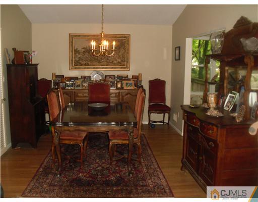 38 Wilk Road Edison, NJ 08837 - Photo 2 of 25 a view of a dining room with furniture window and outside view