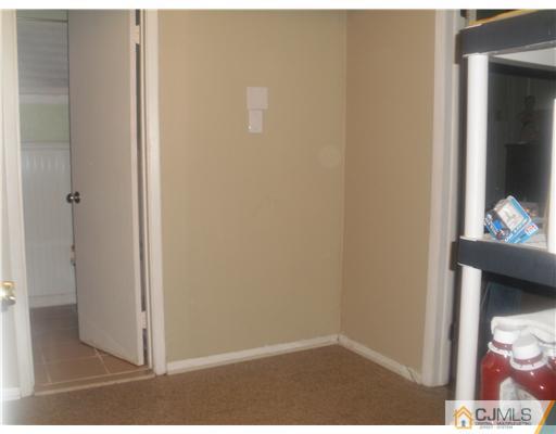 38 Wilk Road Edison, NJ 08837 - Photo 25 of 25 a view of hallway with wooden floor