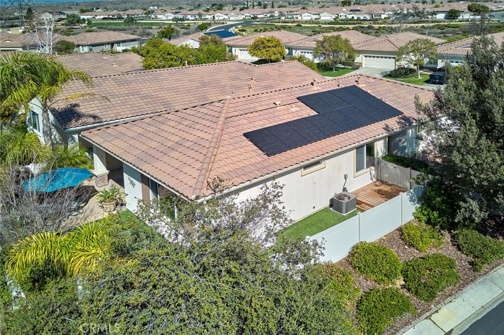 1143 Saguara Road Beaumont, CA 92223 - Photo 31 of 66 an aerial view of a house with a yard and lake view
