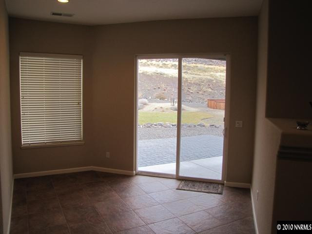 5547 New Mexico Court Reno, NV 89511 - Photo 4 of 12 a view of an empty room and window
