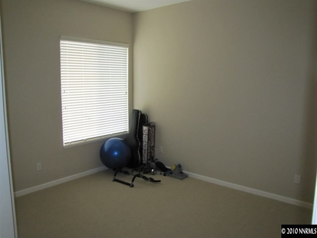 5547 New Mexico Court Reno, NV 89511 - Photo 8 of 12 a room with a window and gym equipment