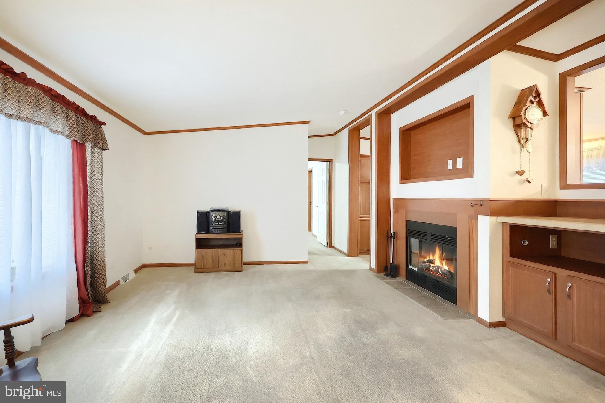 4550 Bull Road Dover, PA 17315 - Photo 11 of 34 a view of a livingroom with an empty space and a fireplace