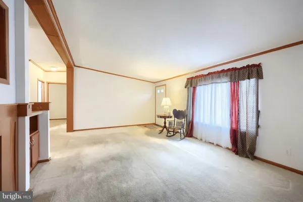 a living room with a fireplace