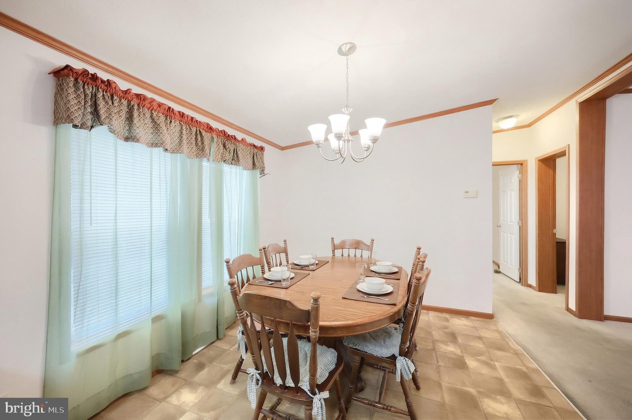 4550 Bull Road Dover, PA 17315 - Photo 15 of 34 a view of a dining room with furniture and chandelier