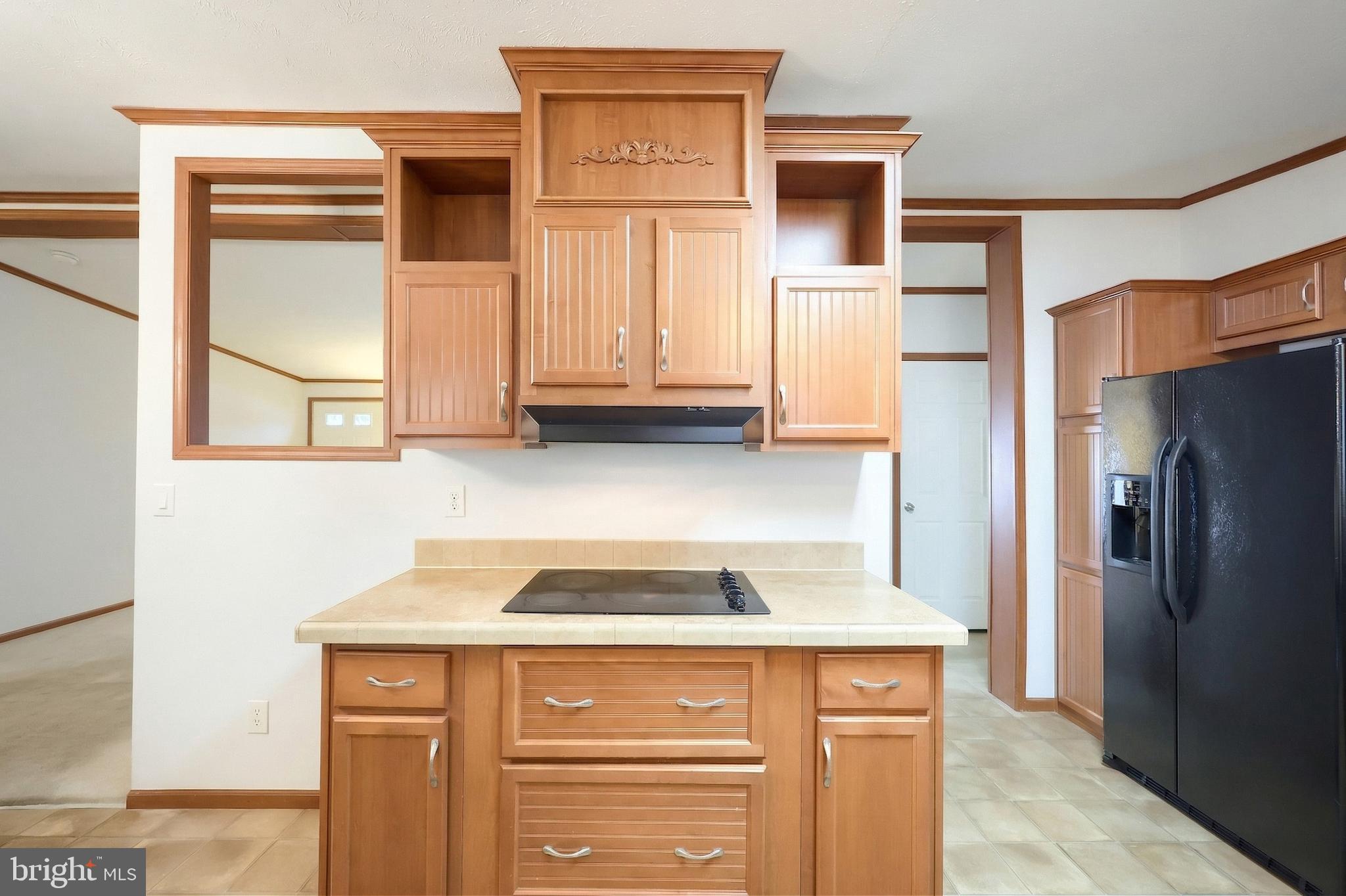 4550 Bull Road Dover, PA 17315 - Photo 20 of 34 a kitchen with a refrigerator and cabinets
