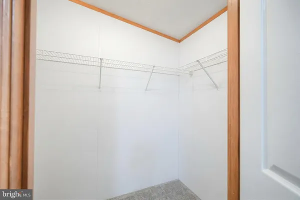 a bathroom with a sink vanity and a mirror