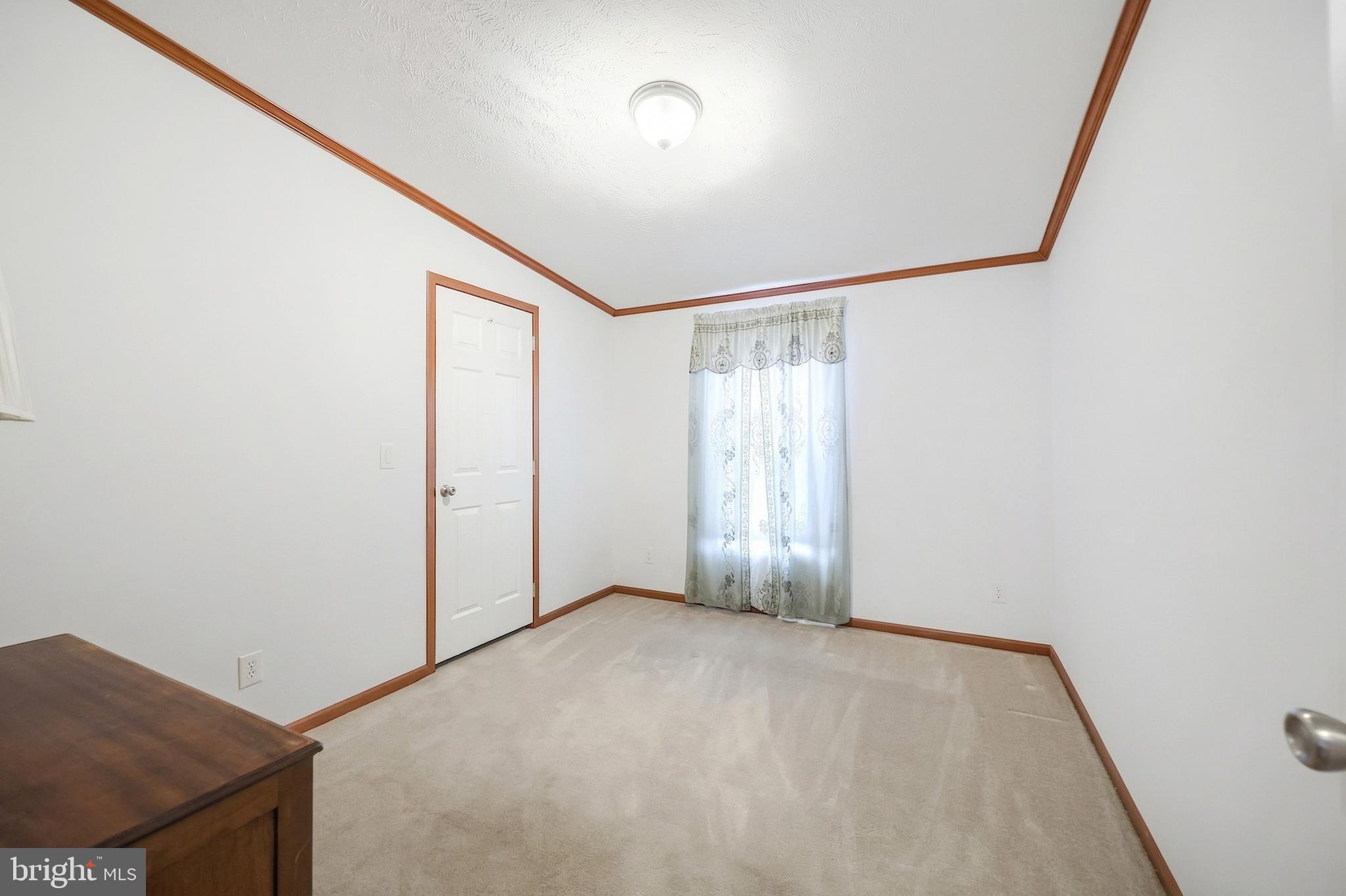 4550 Bull Road Dover, PA 17315 - Photo 31 of 34 a view of an empty room with a window