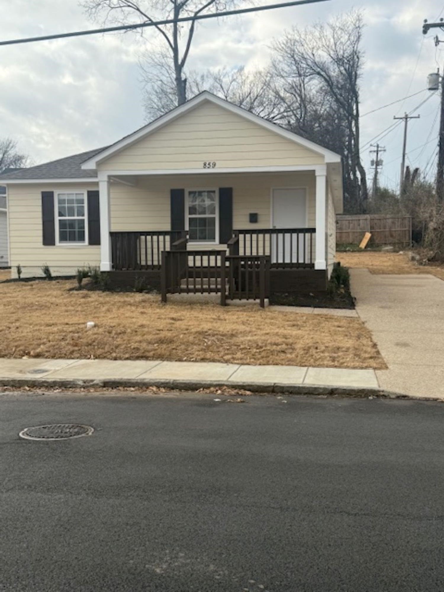 a front view of a house with a porch