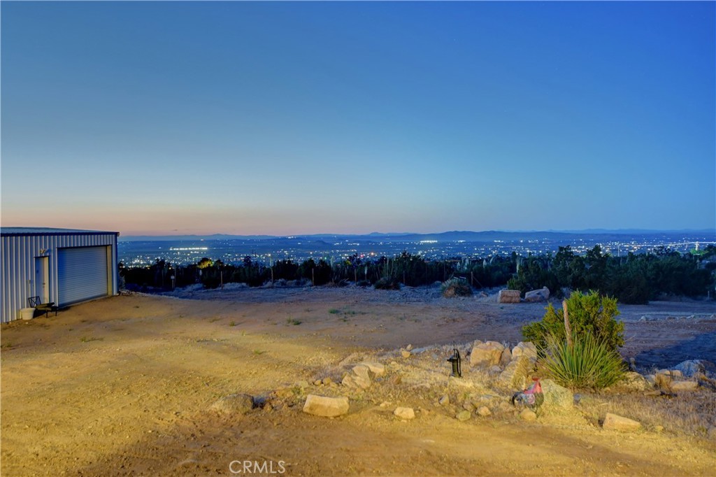 1330 Tamarack Road Pinon Hills, CA 92372 - Photo 13 of 19 a view of a yard with a wooden fence
