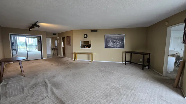 a view of a livingroom with a staircase