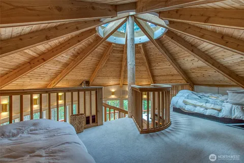 a view of balcony with furniture