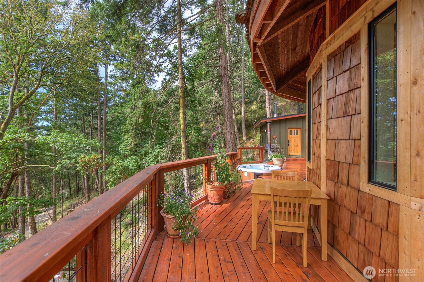 300 Pleasure Horse Road Orcas Island, WA 98245 - Photo 3 of 31 a view of balcony with chairs and wooden fence