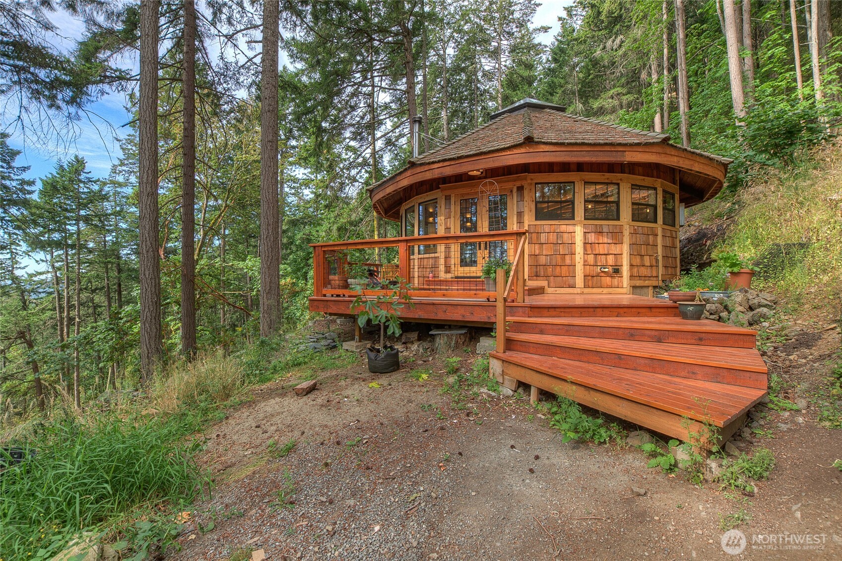 300 Pleasure Horse Road Orcas Island, WA 98245 - Photo 6 of 31 a front view of a house with a yard