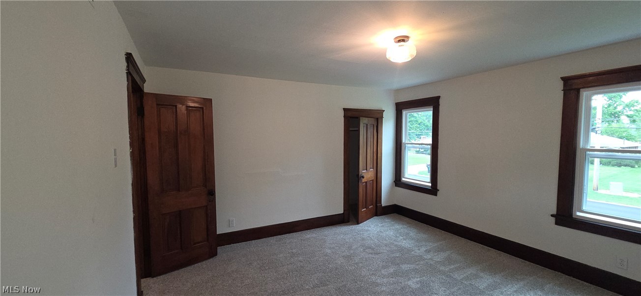 9964 East River Road Elyria, OH 44035 - Photo 23 of 45 Original doors and trim. New windows, new carpet, fresh paint.