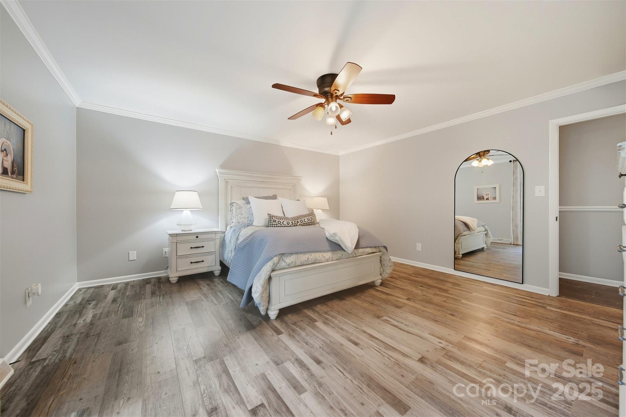 507 6th Avenue Northeast Conover, NC 28613 - Photo 19 of 48 a bedroom with a bed and a chandelier