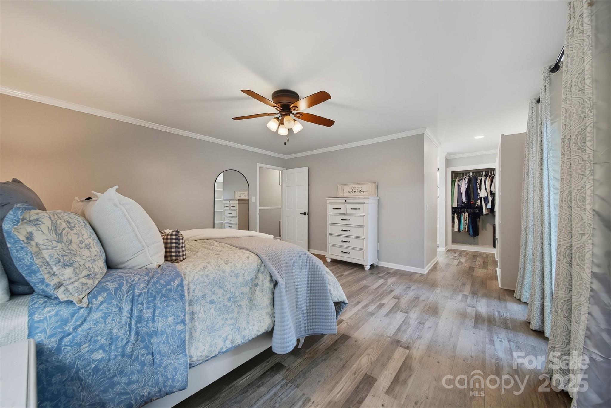 507 6th Avenue Northeast Conover, NC 28613 - Photo 20 of 48 a bedroom with bed and a chandelier