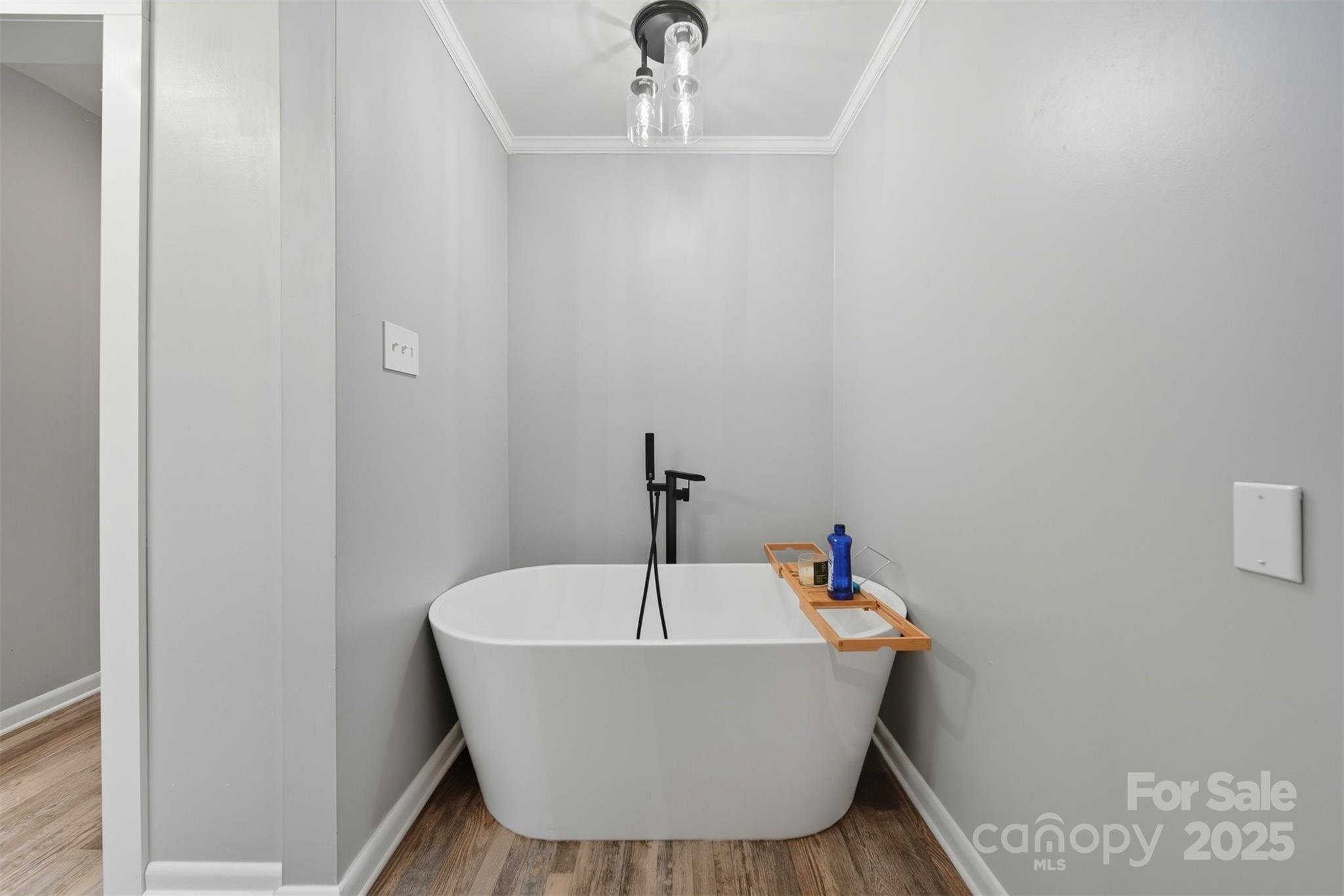 507 6th Avenue Northeast Conover, NC 28613 - Photo 22 of 48 a white bath tub sitting in a bathroom