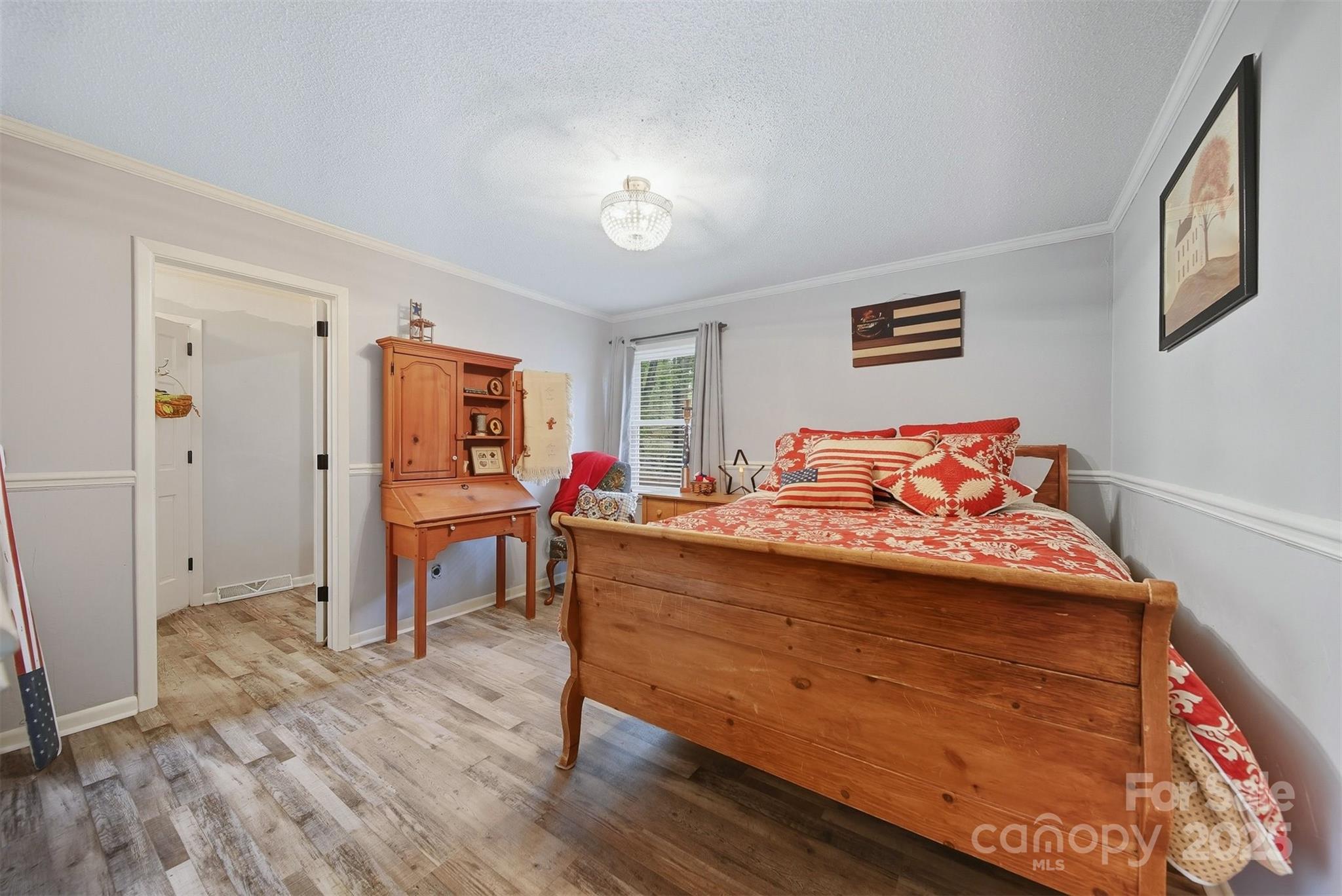 507 6th Avenue Northeast Conover, NC 28613 - Photo 24 of 48 a bed room with a bed and a desk