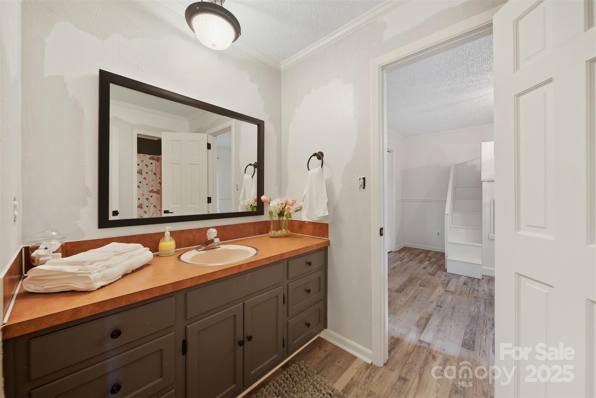 507 6th Avenue Northeast Conover, NC 28613 - Photo 25 of 48 a bathroom with a granite countertop sink mirror and