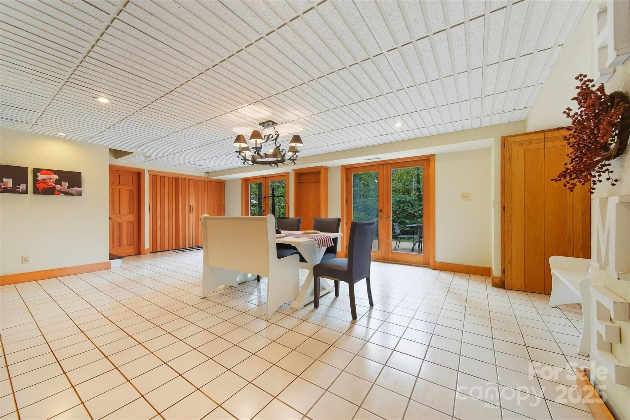 507 6th Avenue Northeast Conover, NC 28613 - Photo 30 of 48 a view of a dining room with furniture a chandelier and window