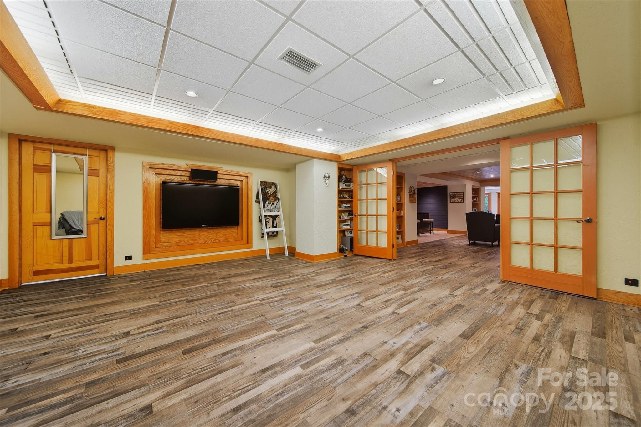 507 6th Avenue Northeast Conover, NC 28613 - Photo 35 of 48 a view of empty room with wooden floor and fan