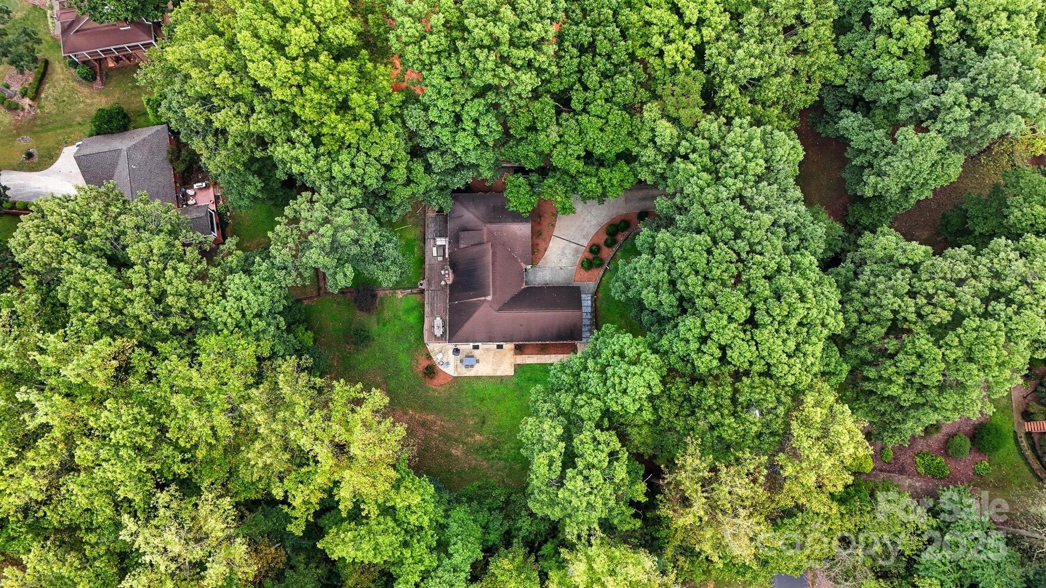 507 6th Avenue Northeast Conover, NC 28613 - Photo 48 of 48 an aerial view of a house with a yard and garden