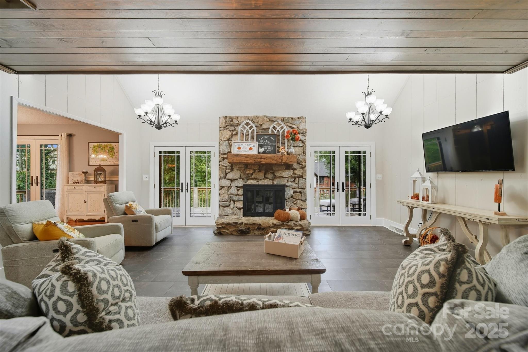 507 6th Avenue Northeast Conover, NC 28613 - Photo 7 of 48 a living room with furniture a flat screen tv and a fireplace