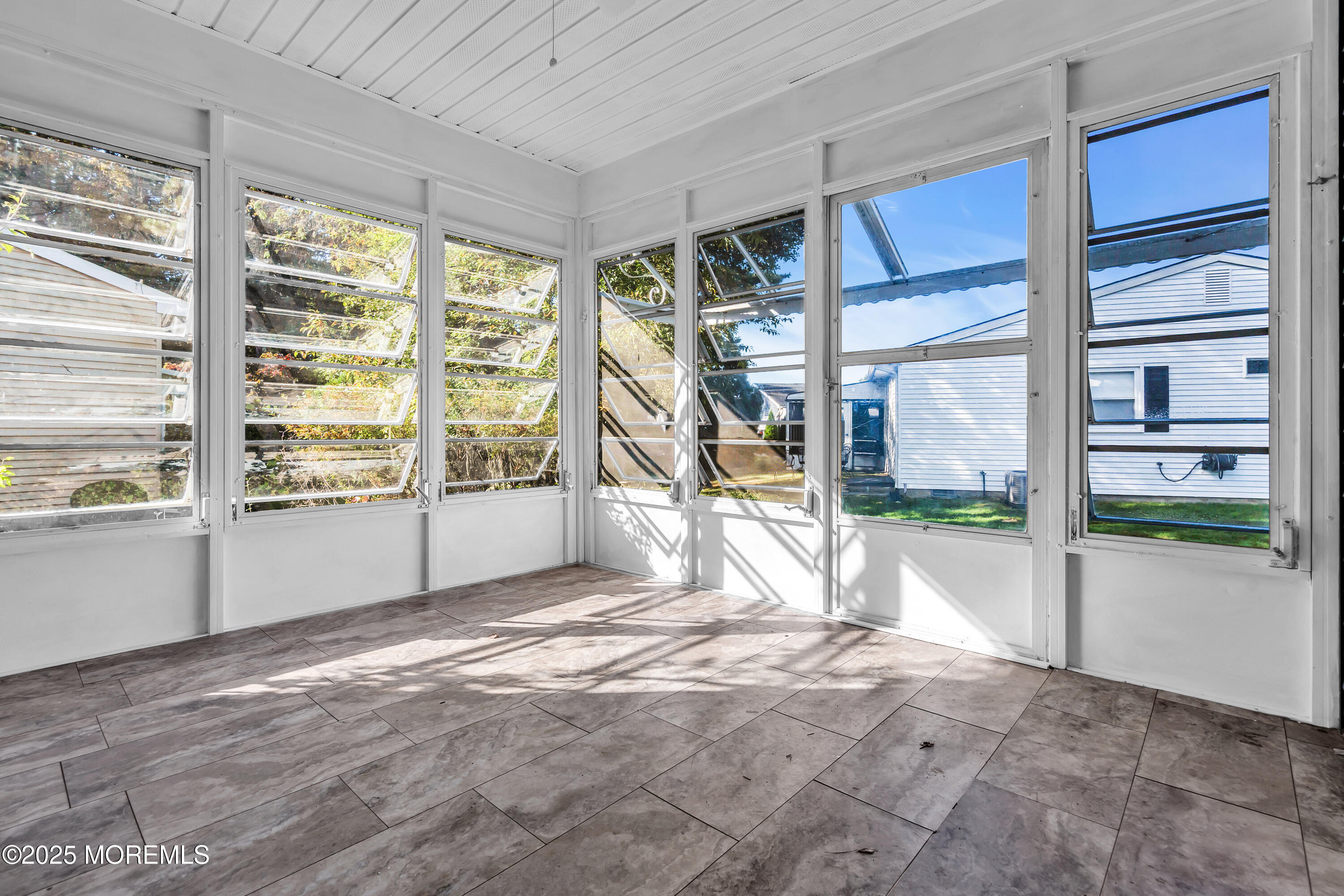 11 Hartford Road, Unit 70 Whiting, NJ 08759 - Photo 28 of 32 a view of an empty room with a window
