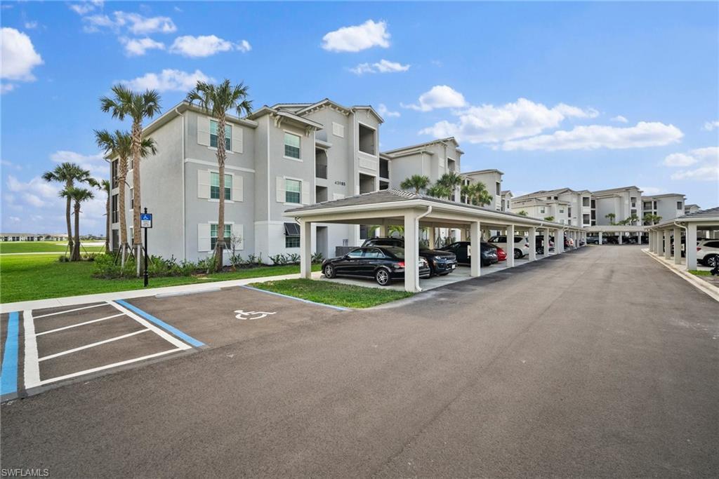 43985 Boardwalk Loop, Unit 2143 Babcock Ranch, FL 33982 - Photo 23 of 25 a view of a city with tall buildings