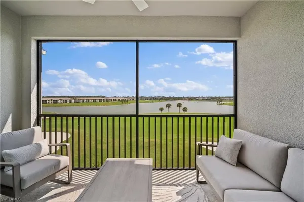 a balcony with furniture