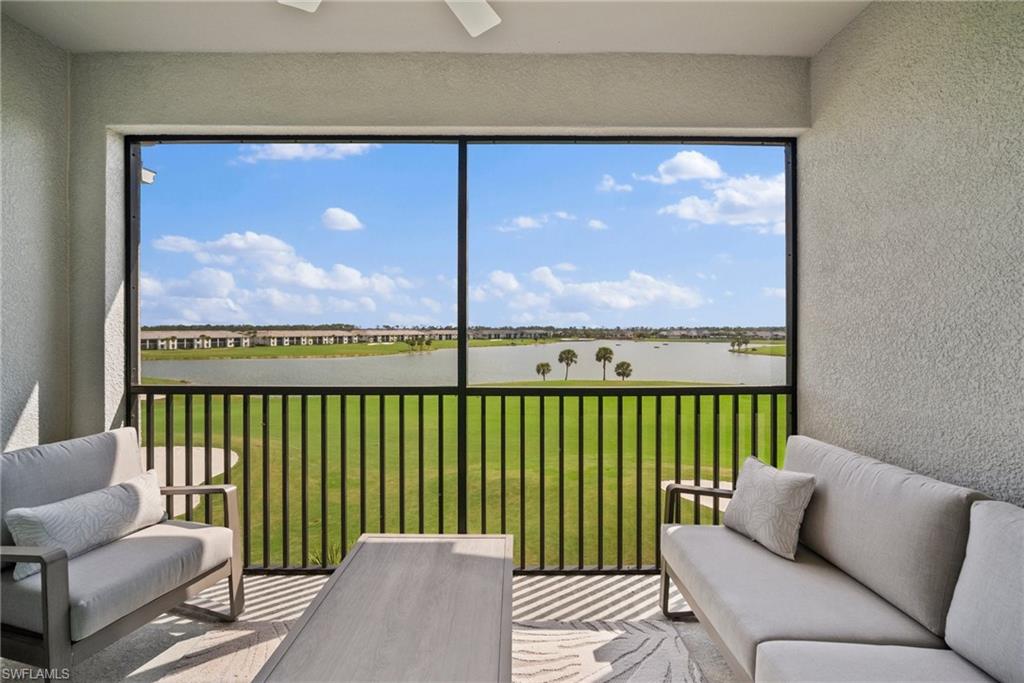 43985 Boardwalk Loop, Unit 2143 Babcock Ranch, FL 33982 - Photo 4 of 25 a balcony with furniture