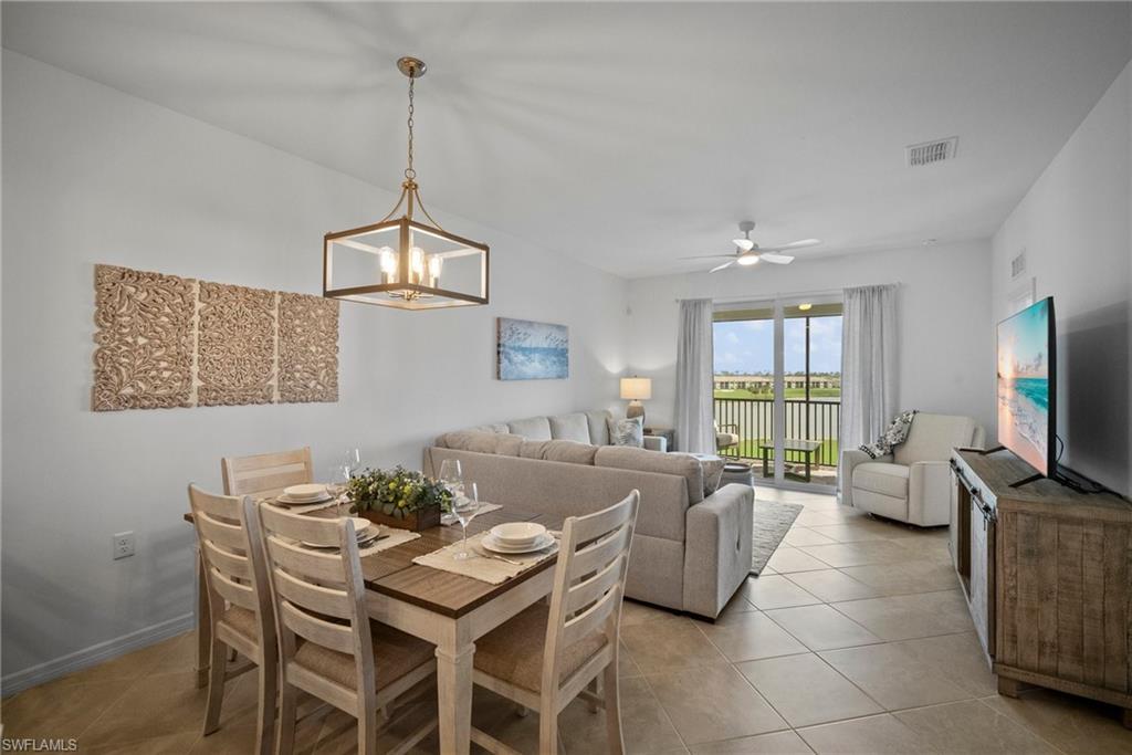 43985 Boardwalk Loop, Unit 2143 Babcock Ranch, FL 33982 - Photo 8 of 25 a view of a livingroom with furniture and window
