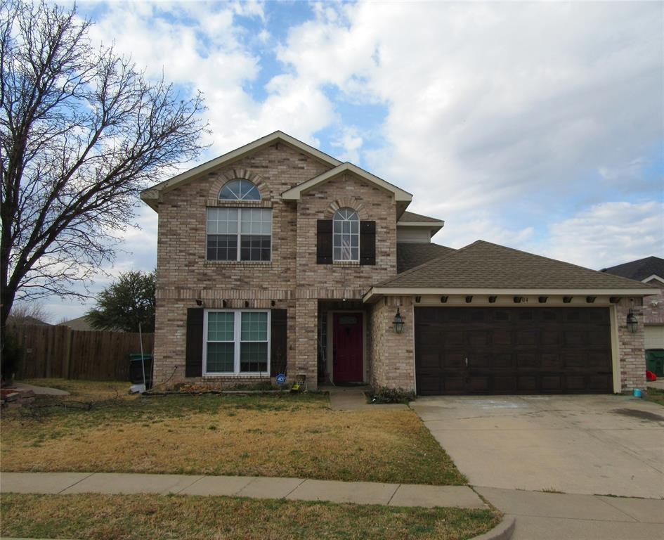 5504 Timber Ridge Court Watauga, TX 76137 - Photo 1 of 1 a front view of a house with a garden