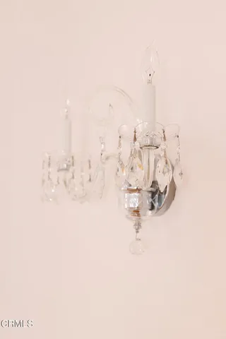 a view of walk in closet with empty empty racks