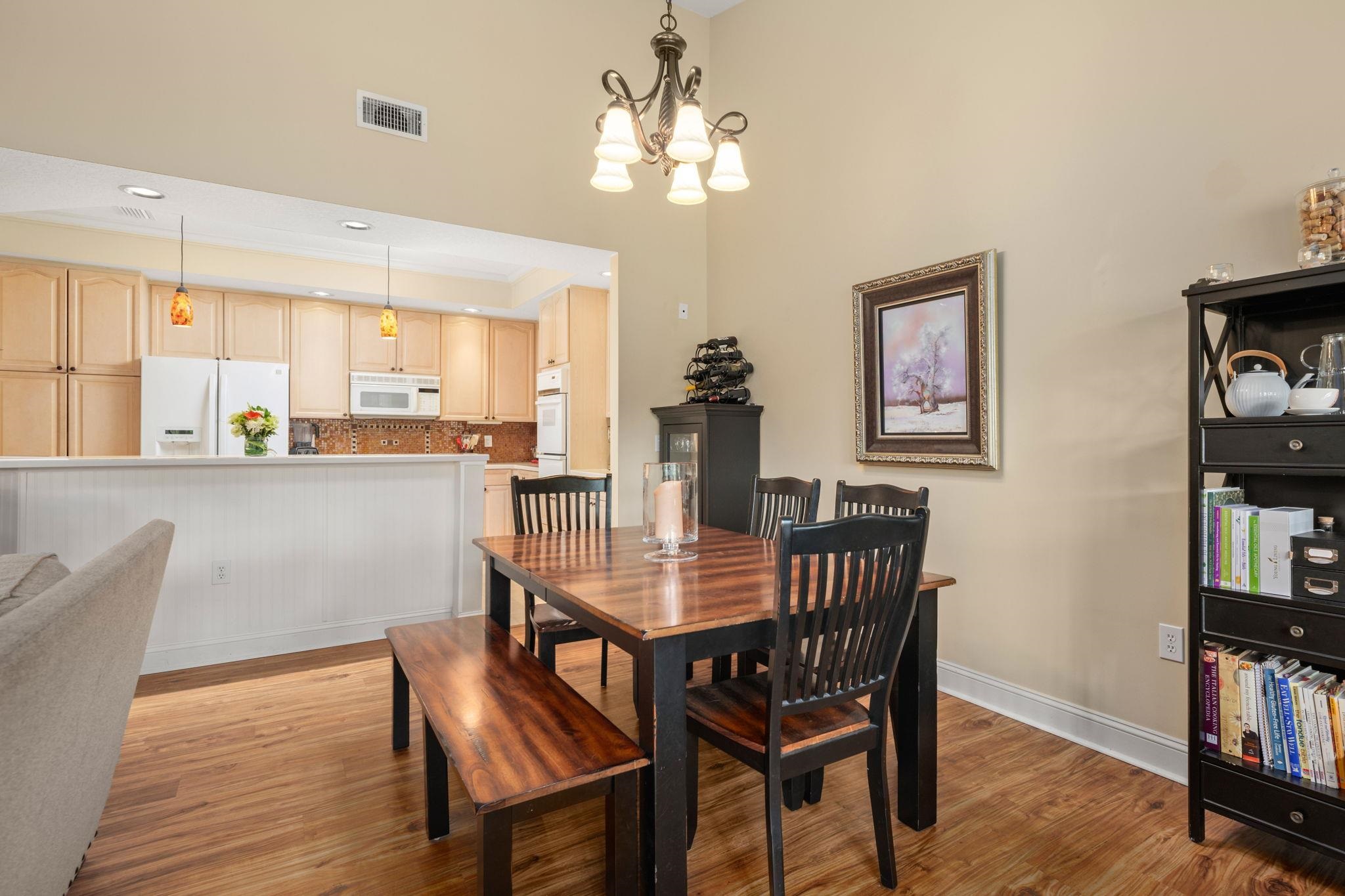 145 North Champions Way, Unit 123 St. Augustine, FL 32092 - Photo 14 of 55 a dining room with furniture and window