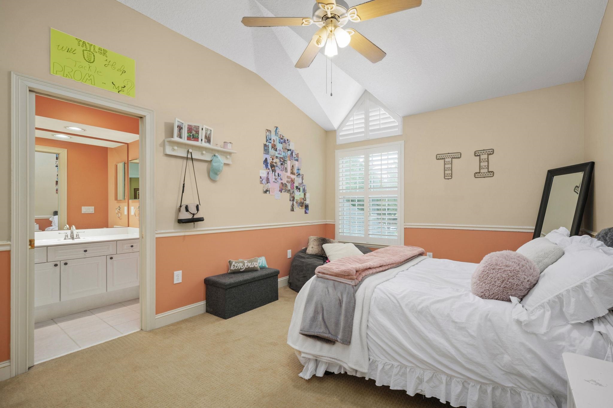 145 North Champions Way, Unit 123 St. Augustine, FL 32092 - Photo 23 of 55 a bedroom with a bed and a chandelier