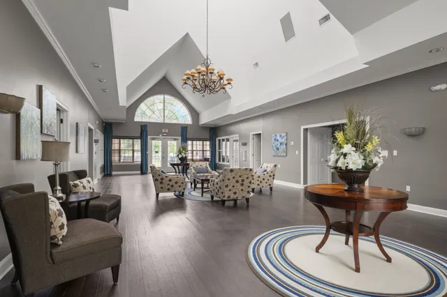 a room with gym equipment and mirrors