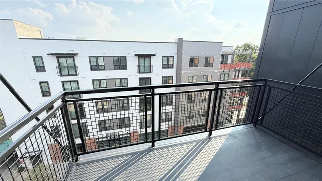 a view of a building from a balcony