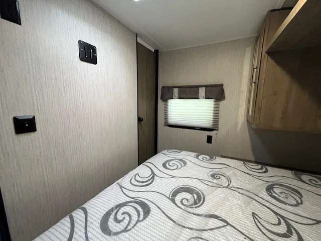 a view of a garage with parked cars