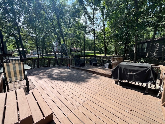 2795 East 28th Road Marseilles, IL 61341 - Photo 5 of 70 a view of a deck with chairs and wooden floor