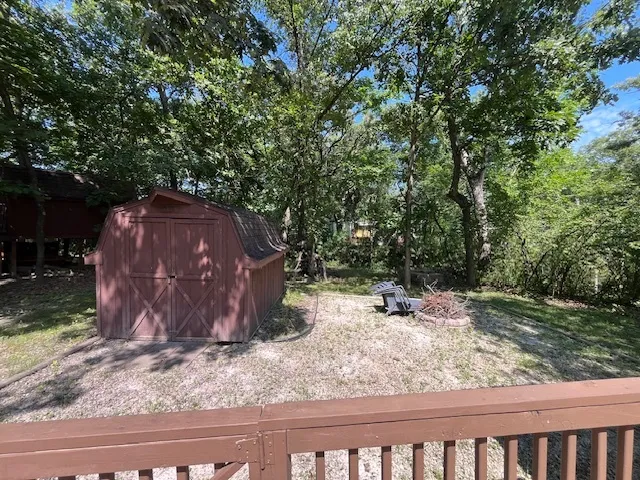 a sign board with a yard