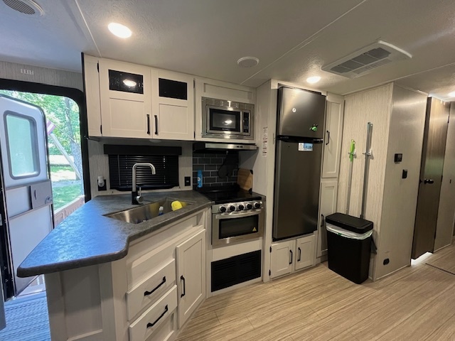 2795 East 28th Road Marseilles, IL 61341 - Photo 10 of 70 a kitchen with stainless steel appliances granite countertop a refrigerator a stove and a sink